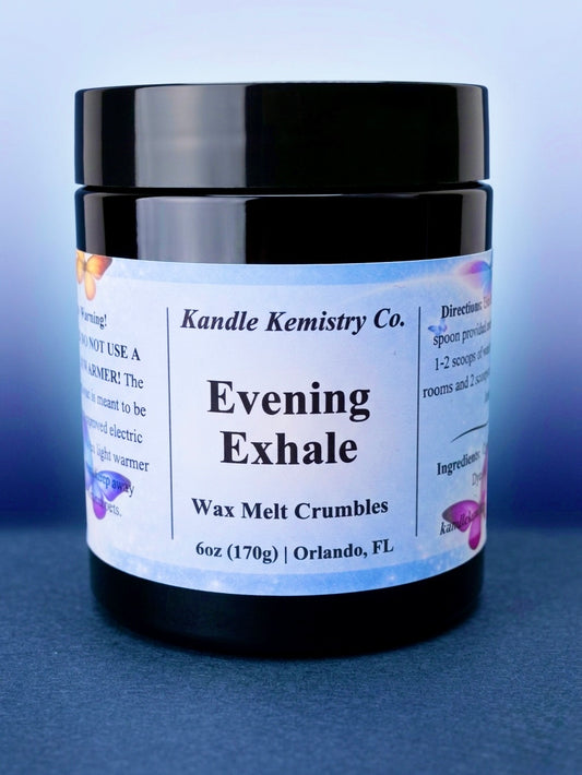 Jar of 'Evening Exhale' wax melt crumbles from Kandle Kemistry Co. on a blue background