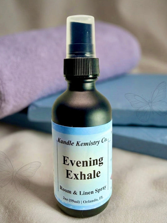 Bottle of 'Evening Exhale' room & linen spray with a label on a neutral background