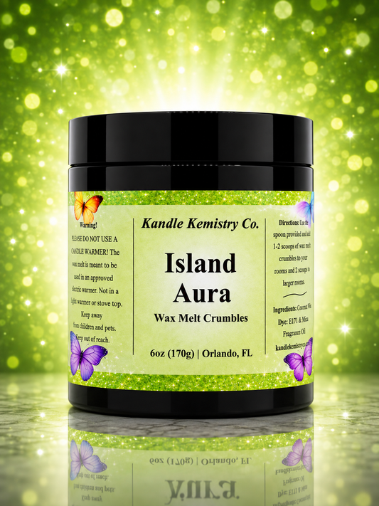 A jar of Kandle Kemistry Co. Island Aura Wax Melt Crumbles, 6 oz, shown against a sparkling green bokeh background with a reflective surface below.