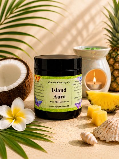 Island Aura wax melt crumbles with wax warmer in tropical setting, coconut and pineapple notes creating a soft luxury home fragrance